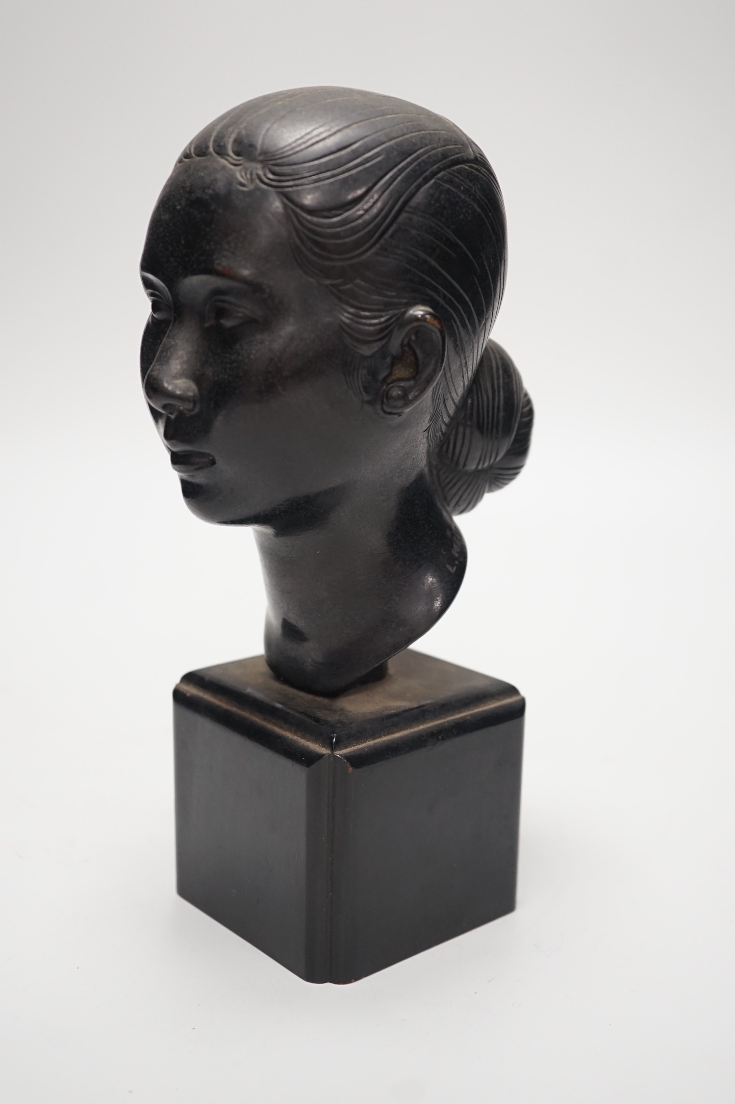 A Vietnamese Bienhao school bronze bust, signed L. Mau to neck, 23cm tall
